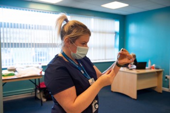 Haxby nurse - Hannah drawing up covid vaccine